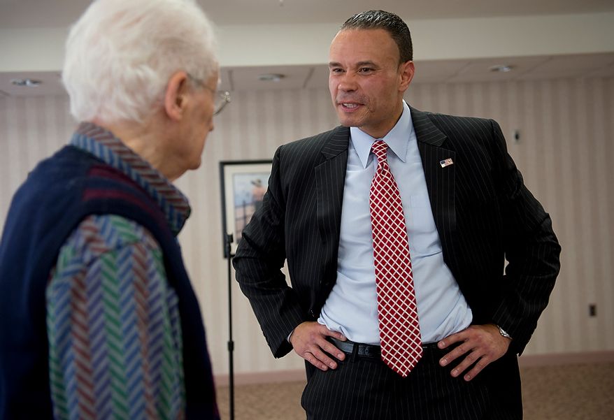 Dan Bongino (right), the Republican candidate for the U.S. Senate from Maryland, speaks with a resident of the Ring House retirement community in Rockville, Md., following a talk he gave there on Thursday, Oct. 18, 2012. Mr. Borgino said that while he recognizes that Maryland is a tough state because it usually votes Democratic, he believes he can win because he is "running on ideas, not party politics." (Barbara L. Salisbury/The Washington Times)