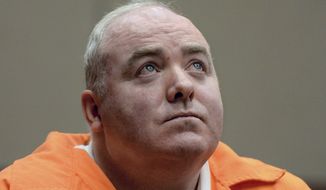 ** FILE ** Michael Skakel looks up while listening to a statement from John Moxley, brother of victim Martha Moxley, in court in Middletown, Conn., on Tuesday, Jan. 24, 2012. (AP Photo/Jessica Hill, Pool)