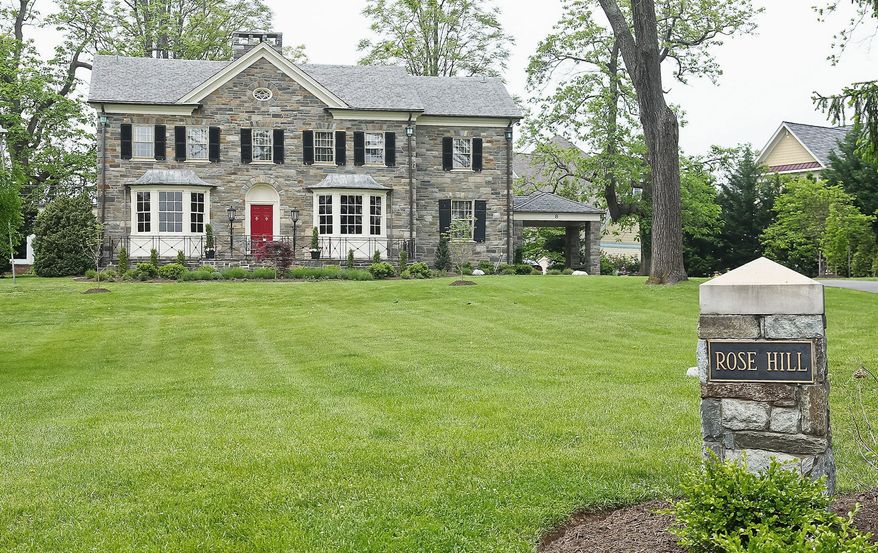 Rose Hill Mansion in Rockville, on the market for $1,995,000, was built in 1908, but has been extensively renovated. The home has six bedrooms, five full baths and a powder room.