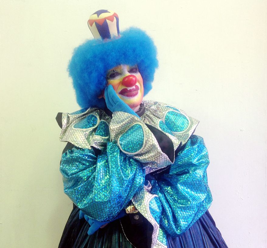 Llantom, 60, poses for a photo during Mexico's 17th annual clown convention, La Feria de la Risa, in Mexico City. Llantom is the fair's principal event organizer and has been in the clown business for 19 years. (AP Photo/Anita Baca)