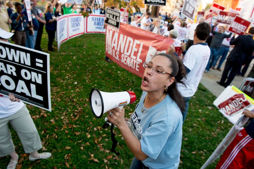 Donna Porter Jones with the Sherrod Brown campaign rallies along with dozens of heated supporters for both U.S. Senate candidates Sen. Sherrod Brown (D-Ohio) and State Treasurer Josh Mandel (R) outside the WCET-TV Studios where the candidates are set to debate each other, Cincinnati, Ohio, Thursday, October 25, 2012. (Andrew Harnik/The Washington