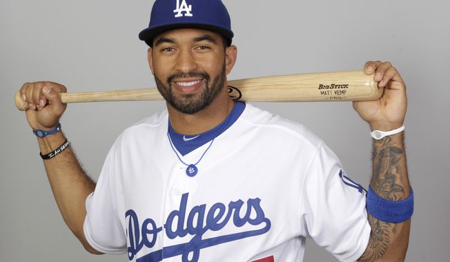 FILE - This 2012 file photo shows Matt Kemp of the Los Angeles Dodgers baseball team.  Kemp is in Arizona to begin rehabbing from the Oct. 5 surgery that repaired a torn labrum and damage to the rotator cuff, injuries resulting from a crash into the center field wall at Coors Field on Aug. 27. Doctors have said he should be ready by spring training. (AP Photo/Jae C. Hong, File)