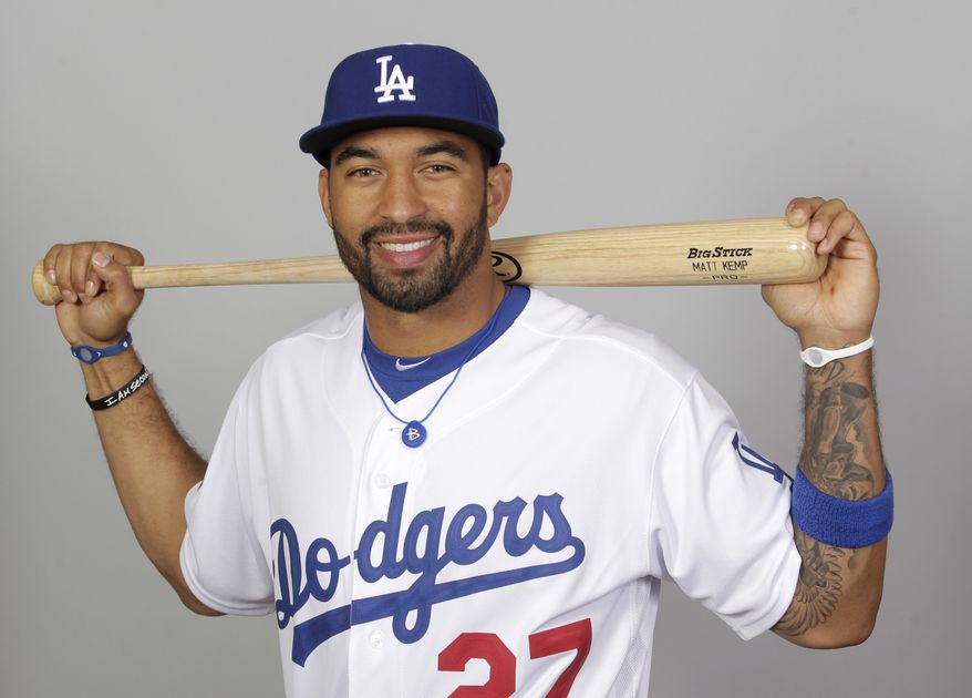 FILE - This 2012 file photo shows Matt Kemp of the Los Angeles Dodgers baseball team. Kemp is in Arizona to begin rehabbing from the Oct. 5 surgery that repaired a torn labrum and damage to the rotator cuff, injuries resulting from a crash into the center field wall at Coors Field on Aug. 27. Doctors have said he should be ready by spring training. (AP Photo/Jae C. Hong, File)
