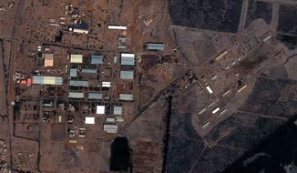 The Yarmouk military complex in Khartoum, Sudan, seen in a satellite image made on Oct. 25 2012, following the alleged attack. A U.S. monitoring group says these satellite images of the aftermath of an explosion at a Sudanese weapons factory suggest the site was hit by an airstrike. The Sudanese government has accused Israel of bombing its Yarmouk military complex in Khartoum, killing two people and leaving the factory in ruins. The images released by the Satellite Sentinel Project to The Associated Press on Saturday, Oct 27 2012, showed several 52-foot wide craters. (AP Photo/ DigitalGlobe via Satellite Sentinel Project)