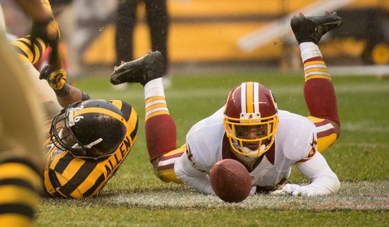 Redskins wide receiver Santana Moss can’t hold onto a fourth-down pass late in the fourth quarter of Sunday’s loss in Pittsburgh. (Andrew Harnik/The Washington Times)