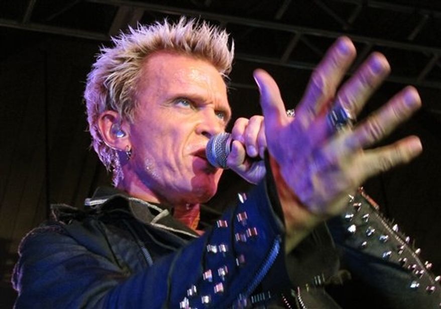Billy Idol performs Friday, Oct. 26, 2012, in Seattle. (AP Photo/Gene Johnson)