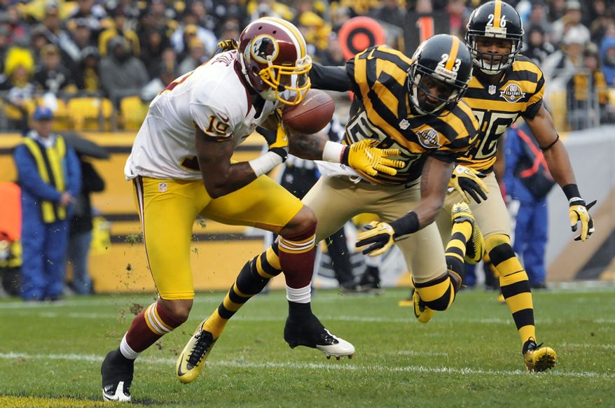 Washington Redskins wide receiver Dezmon Briscoe (19) can't haul in a second quarter touchdown pass in front of Pittsburgh Steelers cornerback Keenan Lewis (23) and strong safety Will Allen (26) at Heinz Field, Pittsburgh, Pa., Oct. 28, 2012. (Preston Keres/Special to The Washington Times)