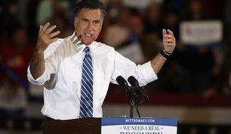 Republican presidential candidate former Massachusetts Gov. Mitt Romney speaks at a campaign rally at the Marion County Fairgrounds in Marion, Ohio, Sunday, Oct. 28, 2012. (AP Photo/Mike Munden)