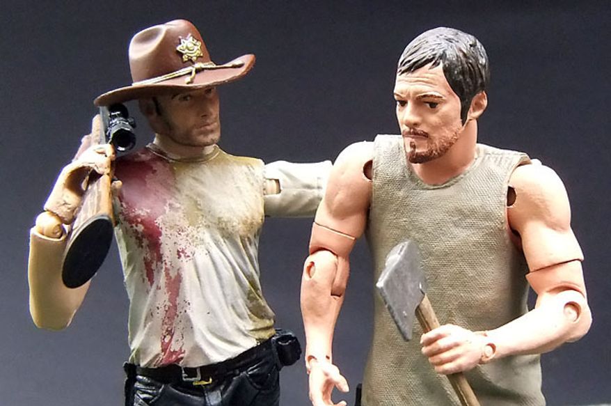 McFarlane Toys' Deputy Rick Grimes has a chat with his pal Daryl Dixon, both stars of The Walking Dead. (Photograph by Joseph Szadkowski / The Washington Times)