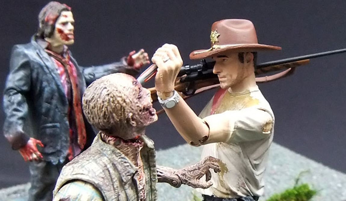 McFarlane Toys&#x27; RV Zombie meets his demise at the hands of Deputy Rick Grimes from The Walking Dead. (Photograph by Joseph Szadkowski / The Washington Times)