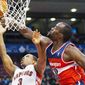 Emeka Okafor (right), a former Rookie of the Year, missed 39 games last season because of a knee injury, but he’s a viable option to start at center for the Wizards until Nene is healthy again. (Associated Press)