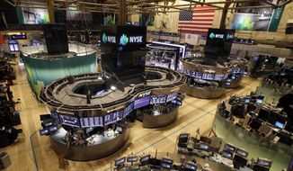 The floor of the New York Stock Exchange is empty of traders, Monday, Oct. 29, 2012, in New York. All major U.S. stock and options exchanges will remain closed Monday with Hurricane Sandy nearing landfall on the East Coast. Trading has rarely stopped for weather. (AP Photo/Richard Drew)