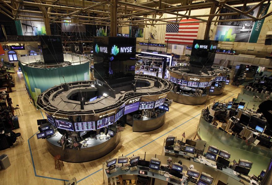 The floor of the New York Stock Exchange is empty of traders, Monday, Oct. 29, 2012, in New York. All major U.S. stock and options exchanges will remain closed Monday with Hurricane Sandy nearing landfall on the East Coast. Trading has rarely stopped for weather. (AP Photo/Richard Drew)