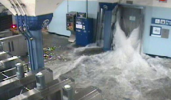 In this photo provided by the Port Authority of New York and New Jersey, a surveillance camera captures the PATH station in Hoboken, N.J., as it is flooded shortly before 9:30 p.m. EDT on Oct. 29, 2012. (Associated Press/Port Authority of New York and New Jersey)