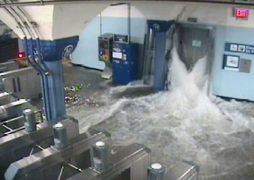 In this photo provided by the Port Authority of New York and New Jersey, a surveillance camera captures the PATH station in Hoboken, N.J., as it is flooded shortly before 9:30 p.m. EDT on Oct. 29, 2012. (Associated Press/Port Authority of New York and New Jersey)