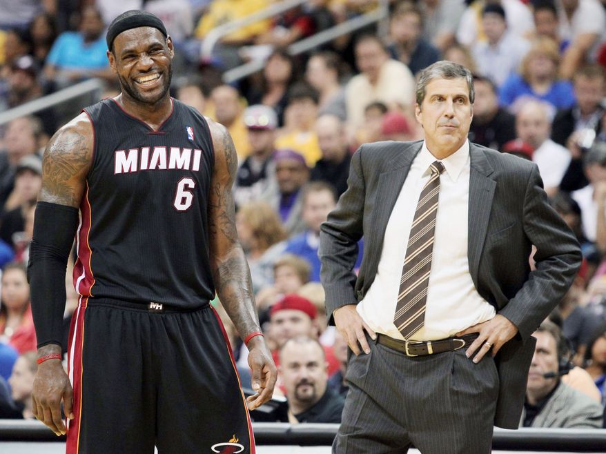 LeBron James and world champion Miami face Boston on Tuesday, while Washington coach Randy Wittman and the Wizards start their season at Cleveland. Also, Dallas visits the Los Angeles Lakers. (Associated Press)