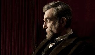 This publicity film image released by Walt Disney Pictures shows Daniel Day-Lewis portraying Abraham Lincoln in the film &quot;Lincoln.&quot; The film, directed by Steven Spielberg, opens in limited release Nov. 9 and nationwide Nov. 16, just after the U.S. presidential election. (AP Photo/Disney-DreamWorks II, David James)

