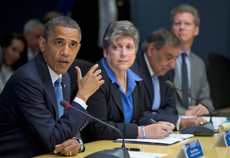 President Barack Obama, accompanied by members of his Cabinet, speaks at the Federal Emergency Management Agency (FEMA) Headquarters in Washington, Wednesday, Oct. 31, 2012, to discuss the recent superstorm Sandy. From left are, the president, Homeland Security Secretary Janet Napolitano, Defense Secretary Leon Panetta, and Housing and Urban Development (HUD) Secretary Shaun Donovan. (AP Photo/Carolyn Kaster)