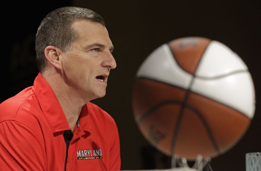 Maryland head coach Mark Turgeon speaks during the Atlantic Coast Conference NCAA college basketball media day in Charlotte, N.C., Wednesday, Oct. 17, 2012. (AP Photo/Chuck Burton)