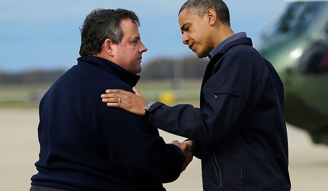 President Obama (right) is greeted by New Jersey Gov. Chris Christie upon the president&#x27;s arrival at Atlantic City International Airport on Wednesday, Oct. 31, 2012, near Atlantic City, N.J. Mr. Obama traveled to the region to take an aerial tour of the New Jersey coastline damaged by Superstorm Sandy. (AP Photo/Pablo Martinez Monsivais)
