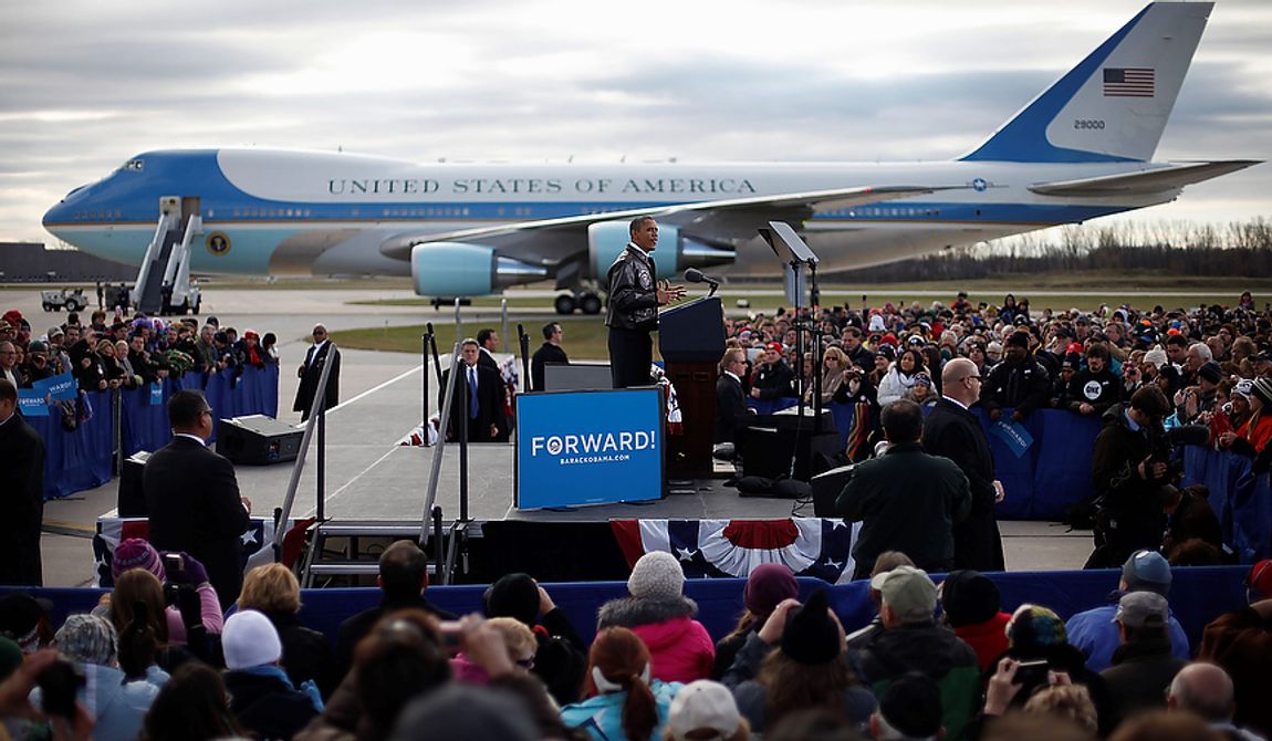 With Air Force One in the background, President Obama speaks to supporters during a campaign event on the apron at Austin Straubel International Airport in Green Bay, Wis., on Thursday, Nov. 1, 2012. Mr. Obama resumed his presidential campaign with travel to the key battleground states of Wisconsin, Colorado, Nevada and Ohio today. (AP Photo/Pablo Martinez Monsivais)