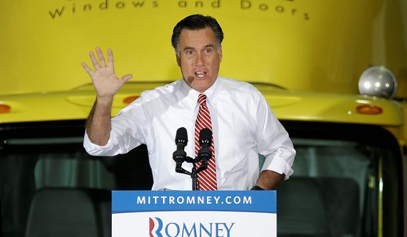 Republican presidential candidate, former Massachusetts Gov. Mitt Romney gestures while speaking at a campaign event at Integrity Windows in Roanoke, Va., Thursday, Nov. 1, 2012.  (AP Photo/David Goldman)