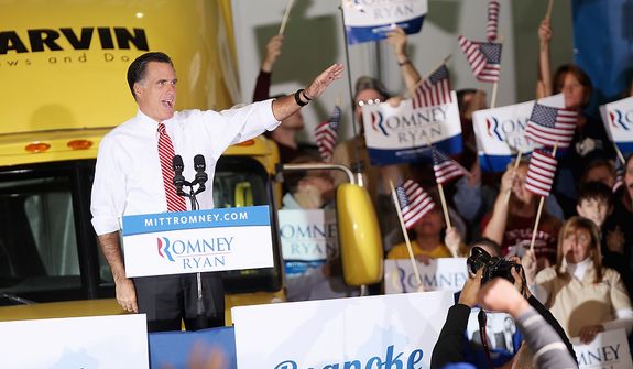 Republican presidential candidate, former Massachusetts Gov. Mitt Romney greets supporters at a campaign event at a window and door factory, Thursday, Nov. 1, 2012, in Roanoke, Va. (AP Photo/The Roanoke Times, Jeanna Duerscherl) 