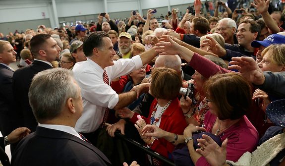 Republican presidential candidate, former Massachusetts Gov. Mitt Romney greets supporters at a campaign stop at Meadow Event Park, in Richmond, Va., Thursday, Nov. 1, 2012. (AP Photo/Charles Dharapak)