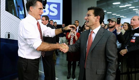 Republican presidential candidate, former Massachusetts Gov. Mitt Romney shakes hands with House Majority Leader Eric Cantor of Va. as he campaigns at Meadow Event Park, in Richmond, Va., Thursday, Nov. 1, 2012. (AP Photo/Charles Dharapak)