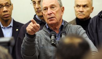 ** FILE ** Mayor Michael Bloomberg speaks to the media at Seward Park High School on the lower east side, the site of one of many public shelters set up in preparation of the storm, Sunday, Oct. 28, 2012, in New York. (AP Photo/ Louis Lanzano)


