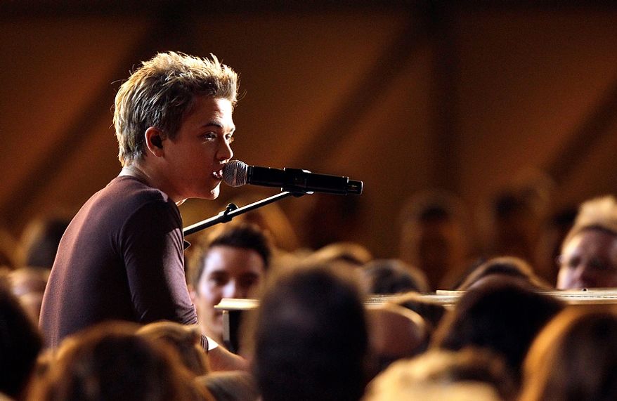 Hunter Hayes performs at the 46th Annual Country Music Awards at the Bridgestone Arena on Thursday, Nov. 1, 2012, in Nashville, Tenn. (Photo by Wade Payne/Invision/AP)