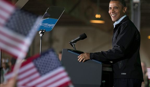 President Barack Obama smile as he speaks at a campaign event at the Franklin County Fairgrounds, Friday, Nov. 2, 2012, in Hilliard, Ohio, before heading to another campaign stop in in Springfield, Ohio. (AP Photo/Carolyn Kaster)
