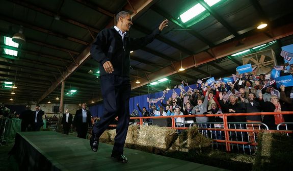 President Barack Obama waves to supporters as he is introduced before speaking at a campaign event at Franklin County Fairgrounds in Hilliard, Ohio, Friday, Nov. 2, 2012. (AP Photo/Pablo Martinez Monsivais)