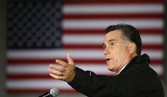 Republican presidential candidate and former Massachusetts Gov. Mitt Romney speaks as he campaigns at Dubuque Regional Airport, in Dubuque, Iowa, Saturday, Nov. 3, 2012. (AP Photo/Charles Dharapak)