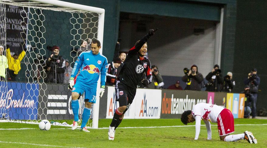 craig bisacre/washington times
D.C. midfielder Nick DeLeon (18) celebrated after New York defender Roy Miller deflected in an own goal in their 1-1 draw Saturday in the first leg of their MLS playoff series.