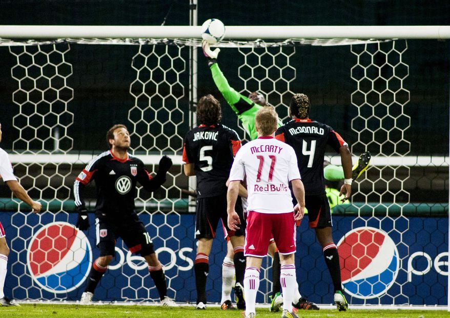 Craig Bisacre/The Washington Times
D.C. goalkeeper Bill Hamid bobbled the ball into his net for a New York goal during the second half Saturday. The second leg of the MLS Eastern Conference semifinal series is Wednesday in Harrison, N.J.