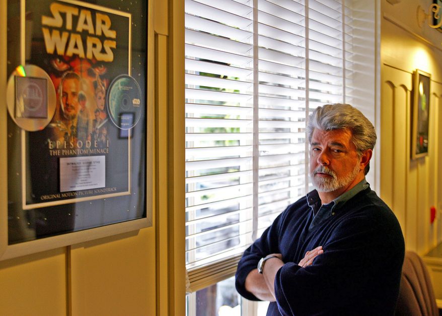 Producer-director George Lucas, who created the "Star Wars" franchise, poses at Skywalker Ranch in San Rafael, Calif., in 2005. (AP Photo/Eric Risberg)