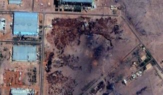 A satellite image from Oct. 25 shows the aftermath of an explosion at a Sudanese weapons factory. (Associated Press)