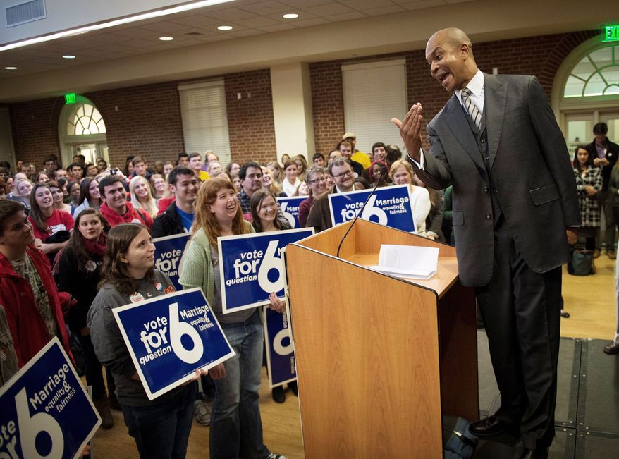 The Rev. Delman Coates approaches the podium at a rally Monday at the University of Maryland in College Park in support of the same-sex marriage referendum. (Rod Lamkey Jr./The Washington Times)