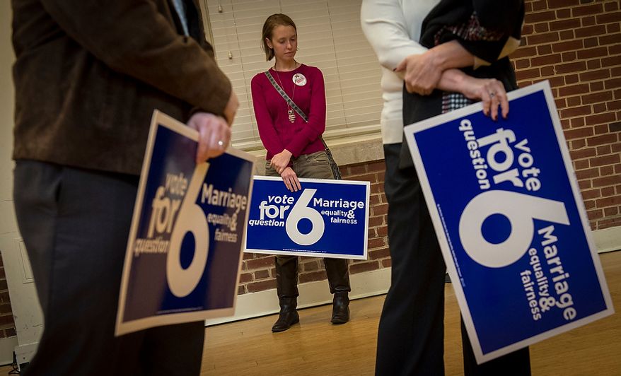Haley Kittleman, 21, daughter of Maryland State Senator Allan Kittleman, waits for the rally to begin, prior to the arrival of Maryland Governor Martin O'Malley (D) for a rally in support of Question 6, at the University of Maryland in College Park, Md., Monday, Nov. 5, 2012. (Rod Lamkey Jr./The Washington Times)