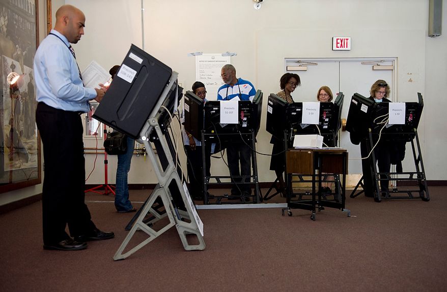 Washington residents take advantage of early voting at Judiciary Square in Washington on Wednesday, Oct. 24, 2012. According to voter site officials, some 2,400 voters had voted here since Monday, when the voting opened. (Barbara L. Salisbury/The Washington Times)