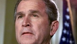 In this Nov. 15, 2000, photo, the then-Republican presidential candidate, Texas Gov. George W. Bush, prepares to make a statement from the Governor&#39;s Mansion in Austin, Texas, concerning the Florida vote count. The mere mention of the 2000 election unsettles people in Palm Beach County. The county&#39;s poorly designed &quot;butterfly ballot&quot; confused thousands of voters, arguably costing Democratic Vice President Al Gore the state and, thereby, the presidency. Mr. Gore won the national popular vote by more than a half-million ballots, but Mr. Bush became president after the Supreme Court decided, 5-4, to halt further Florida recounts, more than a month after Election Day. Mr. Bush carried the state by 537 votes, enough for an Electoral College edge — and the White House. (AP Photo/Eric Gay)