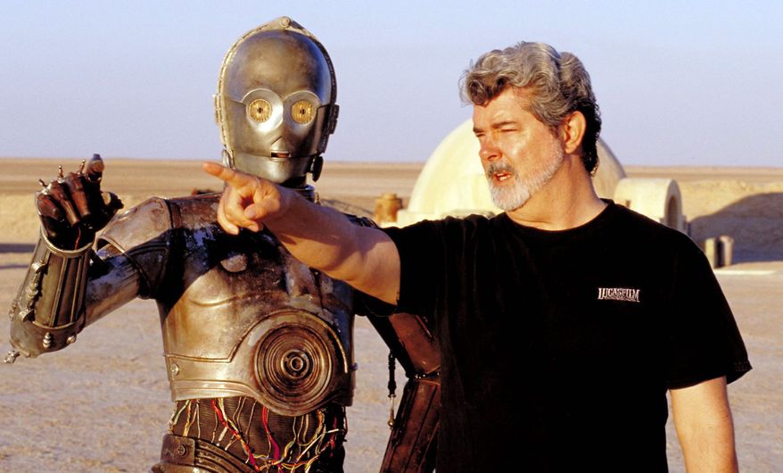 George Lucas directs actor Anthony Daniels, who played the robot C-3PO, in “Star Wars II: Attack of the Clones,” on location in the Tunisia. Numerous high-profile Hollywood directors have been discussed as candidates to helm upcoming sequels. (Associated Press)
