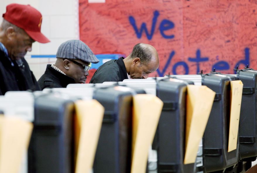 Voters cast their ballots in the general election at the polls set up at Ridgecrest Elementary School, in Hyattsville, on Nov. 6, 2012. (Associated Press)