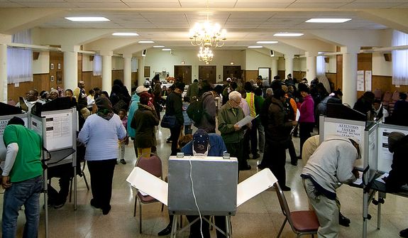Voters cast their ballots at St. Francis Church, Precinct 111 polling site in Washington, D.C., to cast their vote, Tuesday, Nov. 6, 2012 (Craig Bisacre/The Washington Times) ** FILE ** 