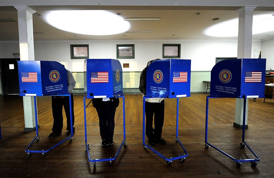 Early morning voting is under way at Bishop Molloy Recreational Center on Tuesday, Nov. 6, 2012, in Point Lookout, N.Y., one of several voting locations that were created as a result of superstorm Sandy. (AP Photo/Kathy Kmonicek)
