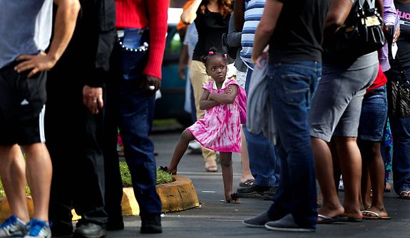 Kezia Gipson, 3, waits with her grandparents Doris Ross and Freddie Irvin in a voting line at the International Longshoreman&#39;s Association Office in Ft. Lauderdale, Fla.Tuesday, Nov. 6, 2012. After a grinding presidential campaign President Barack Obama and Republican presidential candidate, former Massachusetts Gov. Mitt Romney, yield center stage to American voters Tuesday for an Election Day choice that will frame the contours of government and the nation for years to come. (AP Photo/The Miami Herald,Joe Rimkus Jr. )  MAGS OUT
