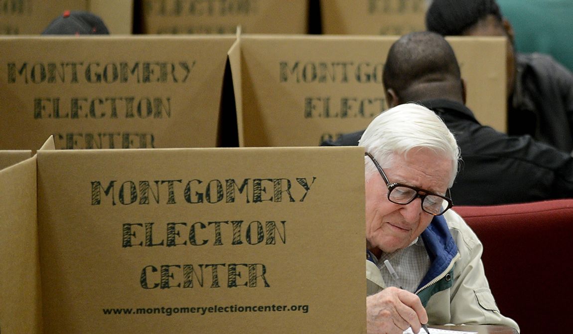 Mervel Parker fills out his ballot to vote in the election at Aldersgate United Methodist Church in Montgomery, Ala., Tuesday, Nov. 6, 2012. (AP Photo/The Montgomery Advertiser, Julie Bennett)  
