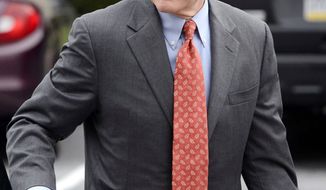 ** FILE ** In this Nov. 7, 2012, former Penn State president Graham Spanier arrives at the office of a Harrisburg District Court judge in Harrisburg, Pa. (Associated Press)
