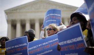 **FILE** Supporters of health care reform rally March 28, 2012, in front of the Supreme Court in Washington. (Associated Press)